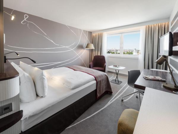 Holiday Inn Munich City Centre, an IHG Hotel : photo 2 de la chambre chambre lit queen-size premium - vue sur ville