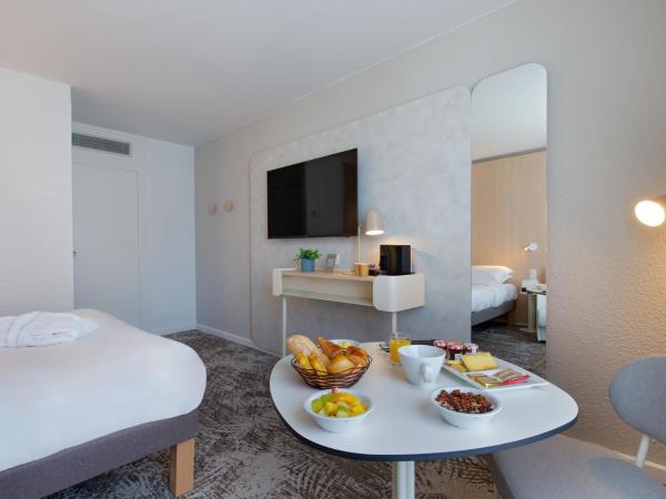 Novotel Aix-en-Provence Pont de L'Arc : photo 5 de la chambre chambre exécutive avec 1 lit double et 1 canapé-lit simple