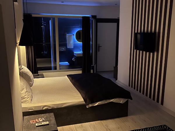 womco butik otel : photo 3 de la chambre chambre deluxe (2 adultes + 1 enfant)