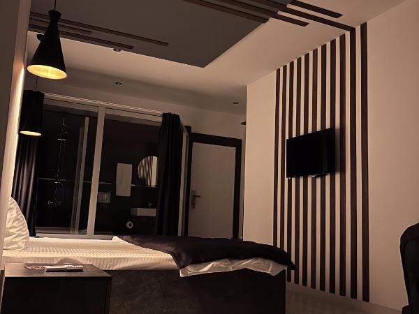 womco butik otel : photo 7 de la chambre chambre deluxe (2 adultes + 1 enfant)