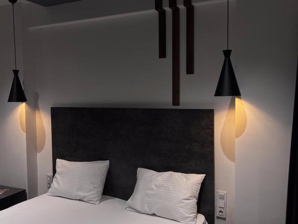 womco butik otel : photo 8 de la chambre chambre deluxe (2 adultes + 1 enfant)