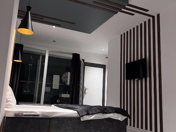 womco butik otel : photo 9 de la chambre chambre deluxe (2 adultes + 1 enfant)