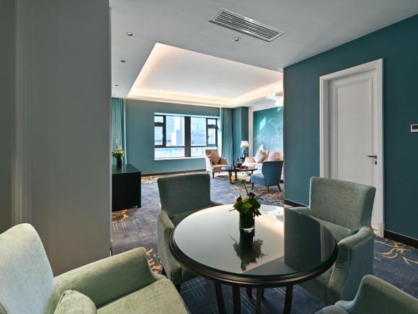 Guangzhou Pan Yu President Hotel : photo 2 de la chambre chambre familiale supérieure