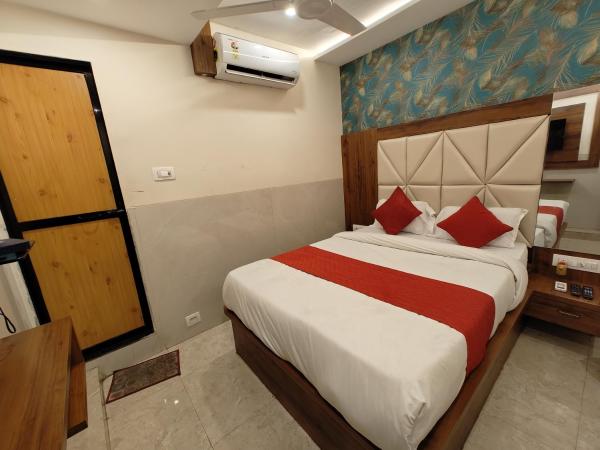 Hotel Dream Palace Residency - Near LBS Marg Kural West : photo 4 de la chambre chambre lit king-size supérieure