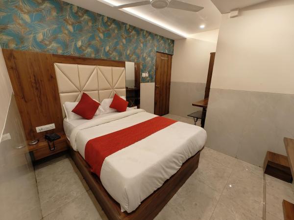 Hotel Dream Palace Residency - Near LBS Marg Kural West : photo 1 de la chambre chambre lit king-size supérieure