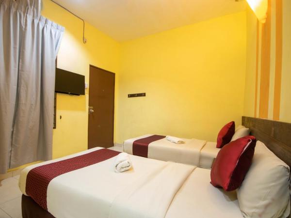 Sun Inns Rest House Kuantan : photo 4 de la chambre hébergement supérieur avec fenêtre