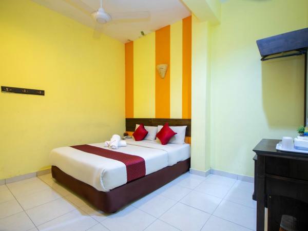 Sun Inns Rest House Kuantan : photo 1 de la chambre hébergement de luxe avec fenêtre