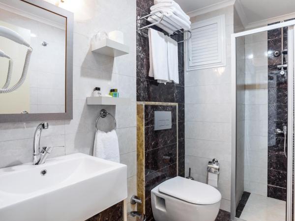 Ayhan Hotel : photo 2 de la chambre chambre triple deluxe