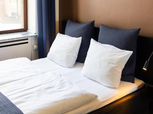 Milling Hotel Ritz Aarhus City : photo 3 de la chambre petite chambre lit queen-size