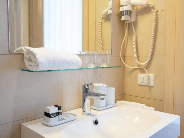 B&B Villa Rosa : photo 8 de la chambre chambre triple supérieure