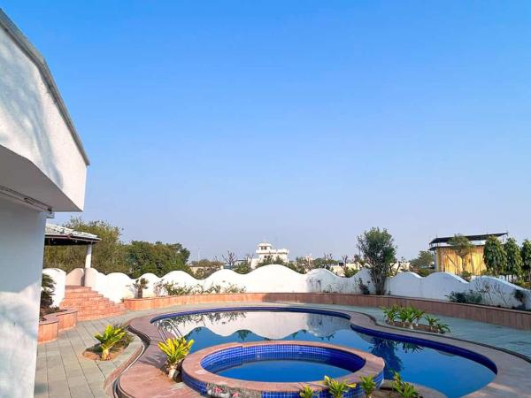 pool loft : photo 4 de la chambre chambre lit king-size - vue sur jardin