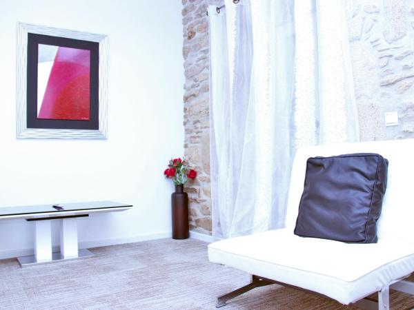 Hotel Montenegro Compostela : photo 2 de la chambre chambre familiale