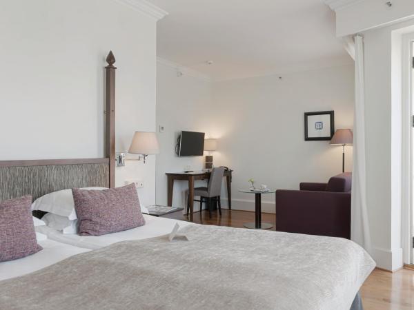 Elite Park Avenue Hotel : photo 6 de la chambre chambre lit king-size avec balcon