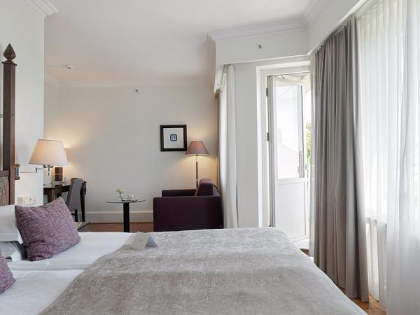 Elite Park Avenue Hotel : photo 1 de la chambre chambre lit king-size avec balcon