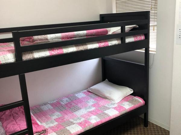 Hanmadang : photo 1 de la chambre chambre lits jumeaux avec salle de bains commune