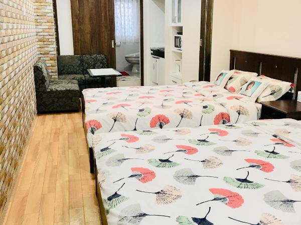 Hanmadang : photo 1 de la chambre chambre double avec 2 lits doubles