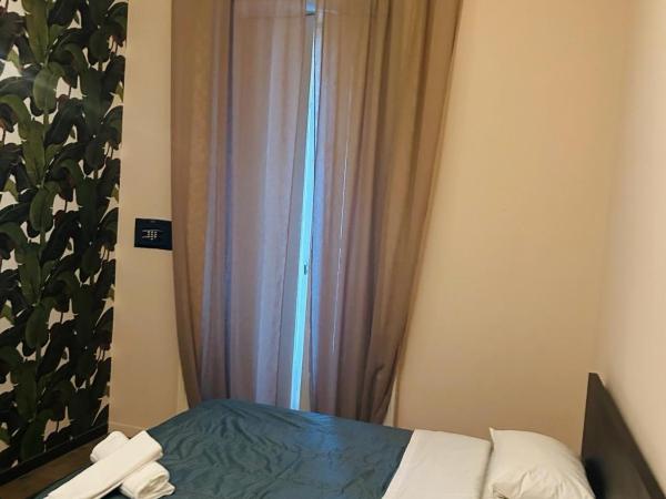Family Hostel Milano : photo 8 de la chambre chambre double ou lits jumeaux avec salle de bains commune