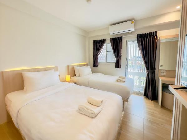 Zhennan Teabar Hotel : photo 2 de la chambre chambre lits jumeaux - vue sur ville