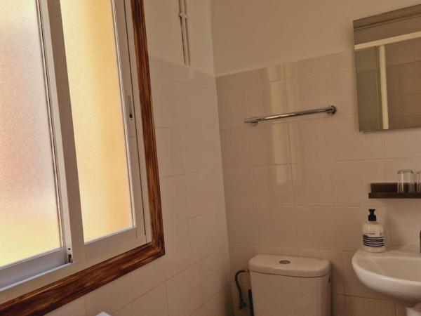 Casa de Huespedes Dolce Vita : photo 6 de la chambre chambre lits jumeaux avec lit d’appoint - 301