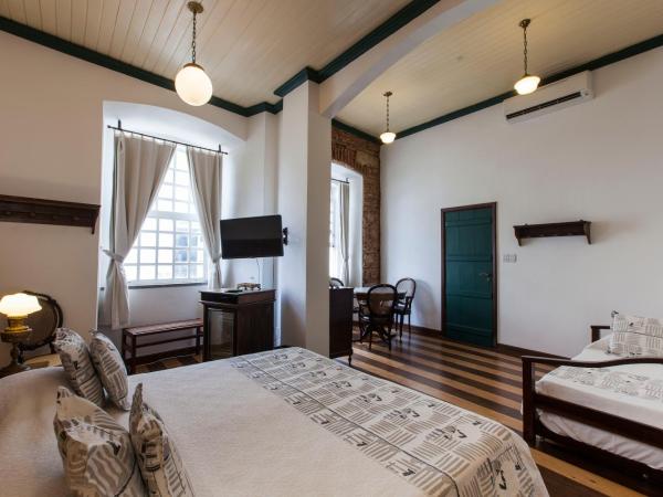 Pousada Solar dos Deuses : photo 1 de la chambre chambre familiale de luxe