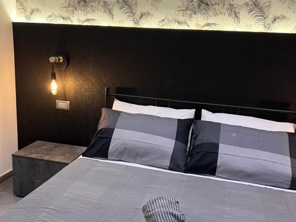 Nanà Home : photo 3 de la chambre chambre double deluxe - vue latérale sur mer