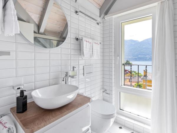 Art Hotel Riposo : photo 5 de la chambre appartement - vue sur lac