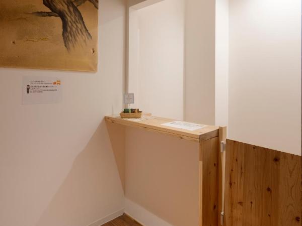 Iwatoyama Hostel : photo 4 de la chambre lit superposé dans dortoir mixte