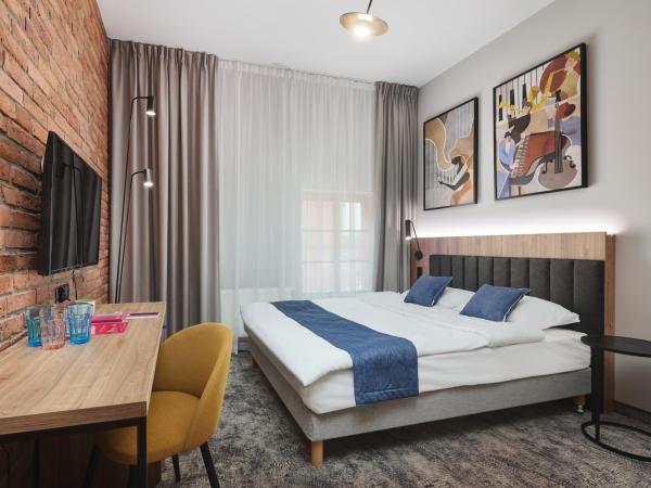 Halo Szczecin : photo 1 de la chambre chambre deluxe double ou lits jumeaux