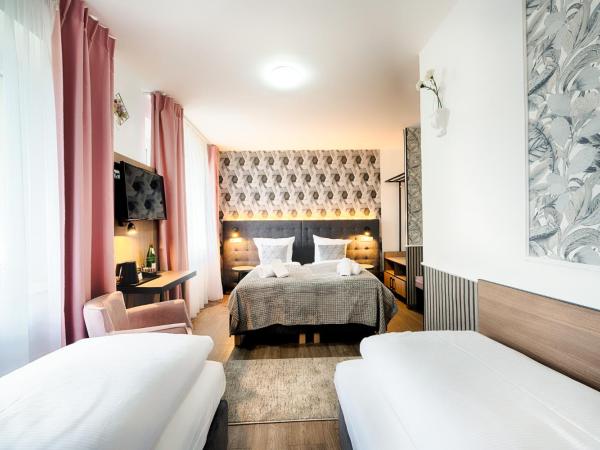 Home Hotel : photo 8 de la chambre chambre quadruple standard