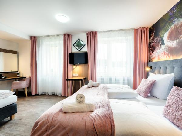 Home Hotel : photo 2 de la chambre chambre triple