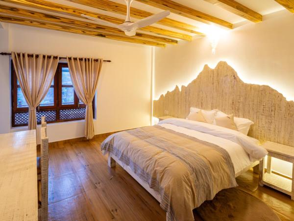 Purna : photo 2 de la chambre chambre double - vue sur jardin