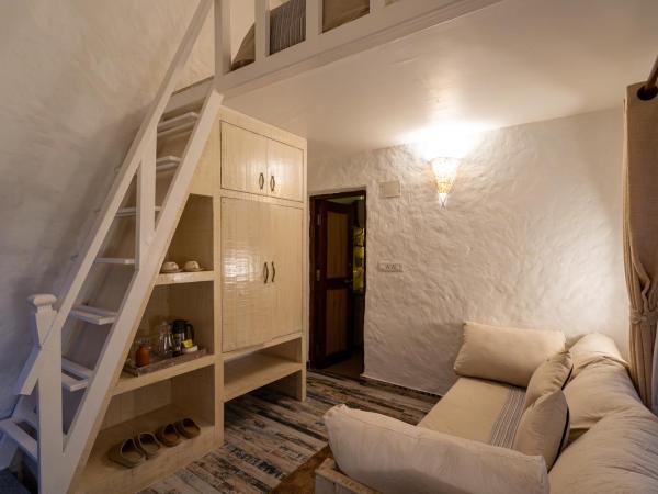 Purna : photo 3 de la chambre chambre familiale - vue sur jardin