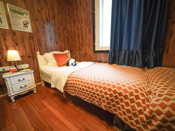 Chengdu Mix Hostel Courtyard Poshpacker (Wenshu Monastery) : photo 6 de la chambre chambre triple basique