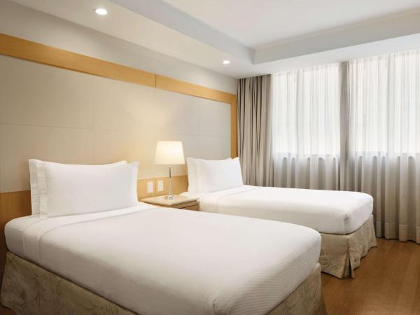 Hilton Copacabana Rio de Janeiro : photo 2 de la chambre chambre avec 2 lits jumeaux - vue sur ville