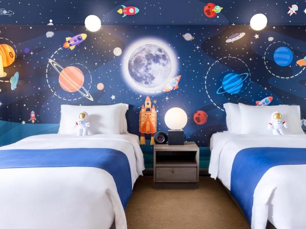 Avani Pattaya Resort : photo 2 de la chambre chambre familiale - vue sur jardin