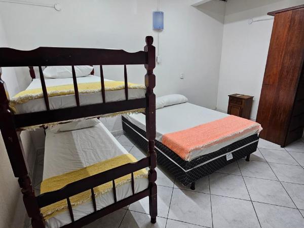 Pousada Casa da Pedra : photo 2 de la chambre chambre quadruple Économique