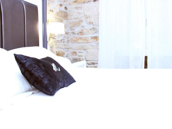 Hotel Montenegro Compostela : photo 3 de la chambre chambre familiale