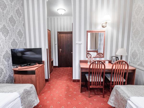 Hotel Restauracja Browar Lwów w Lublinie : photo 2 de la chambre chambre lits jumeaux