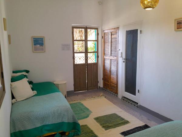 Vent Des Dunes : photo 3 de la chambre chambre triple - vue sur jardin