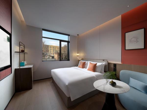 SSAW Garden Hotel Beijing : photo 1 de la chambre chambre supérieure lit queen-size