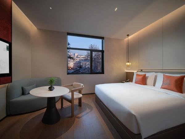 SSAW Garden Hotel Beijing : photo 2 de la chambre chambre lit queen-size - vue sur jardin