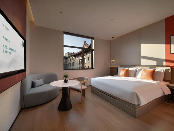 SSAW Garden Hotel Beijing : photo 6 de la chambre chambre lit queen-size - vue sur jardin