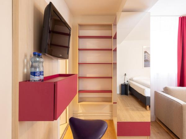 Fred Guest House Zürich Hauptbahnhof : photo 6 de la chambre chambre triple