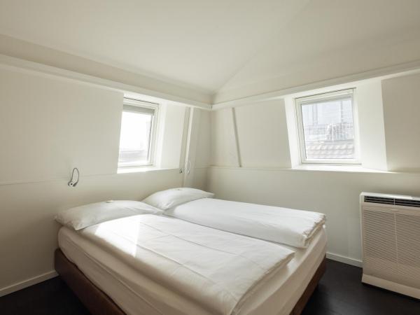 Fred Guest House Zürich Hauptbahnhof : photo 2 de la chambre chambre double plus