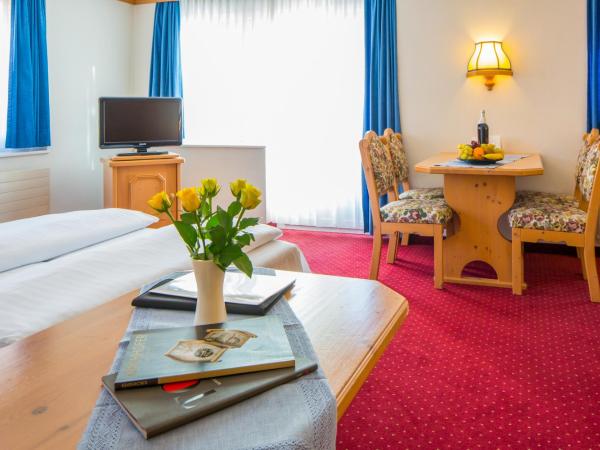 Hotel Grindelwalderhof : photo 2 de la chambre chambre quadruple