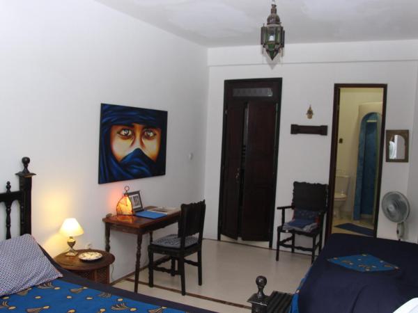 Pousada Esmeralda : photo 2 de la chambre suite familiale deluxe