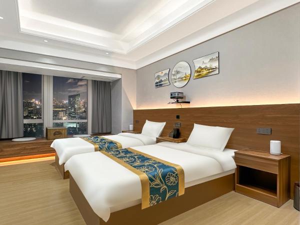 Xingyin Cloudy Hotel Guangzhou Changgang Subway Station - Free Shuttle Bus to Canton Fair Complex During Canton Fair Period : photo 3 de la chambre chambre lits jumeaux - vue sur ville