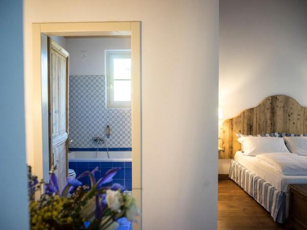 La Vineria di San Mattia : photo 3 de la chambre grande chambre double ou lits jumeaux