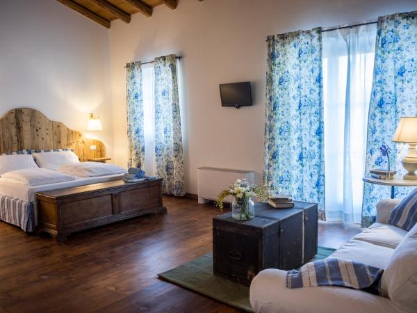 La Vineria di San Mattia : photo 2 de la chambre grande chambre double ou lits jumeaux