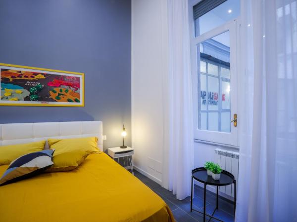 Napoli Games Apartments by Dimorra : photo 9 de la chambre chambre quadruple deluxe